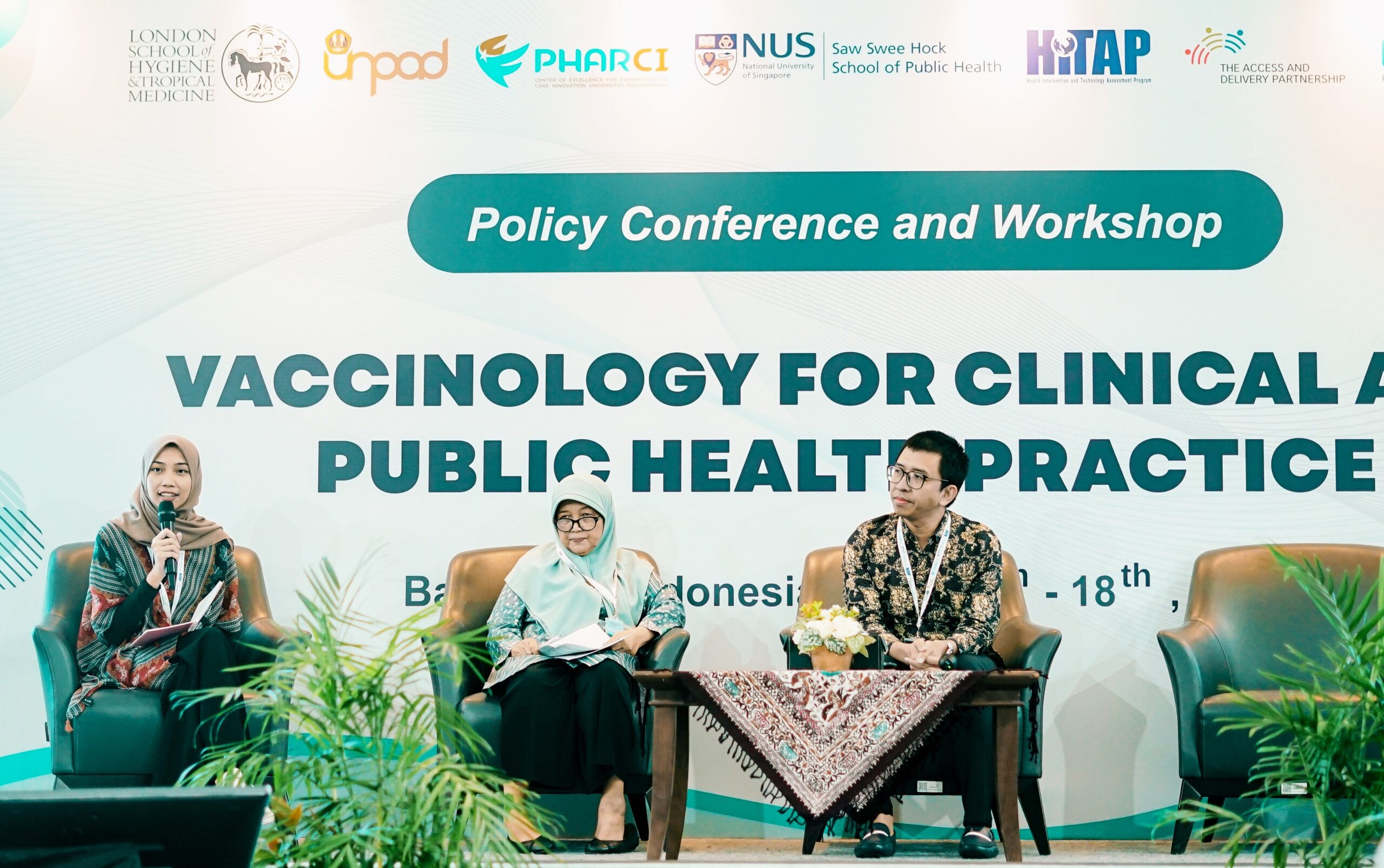 Khansa Chavarina, HITAP, Prof Mardiati Nadjib, Indonesia HTA committee, and Dr. Auliya Abdurrohim Suwantika, UNPAD, participate in a session on setting priorities for new vaccines, during the Policy Conference and Workshop on Vaccinology for Clinical and Public Health Practice in Bandung, Indonesia. Photo: HITAP.